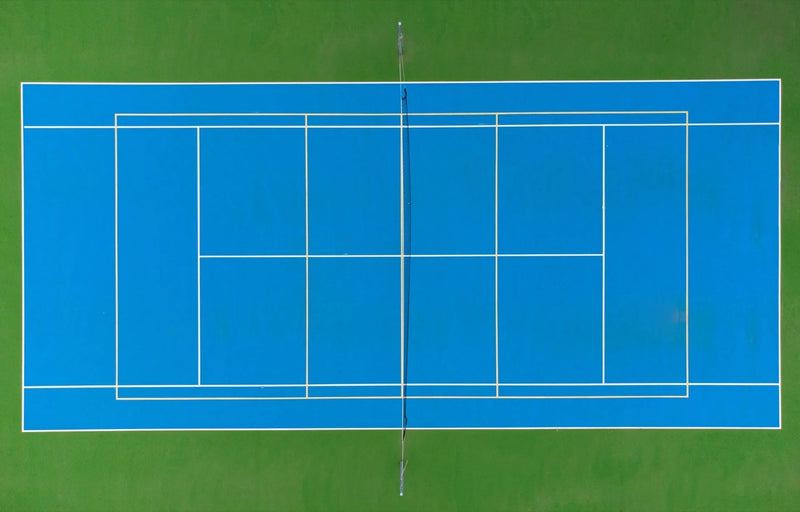 Drone aerial of acrylic tennis court — pan-India construction