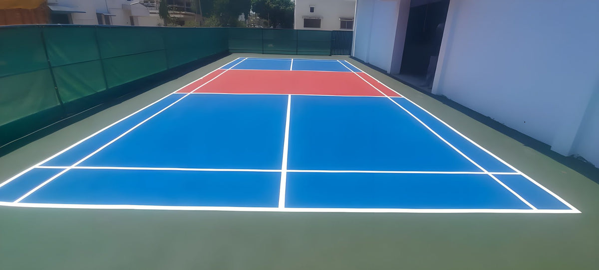 Blue and red acrylic pickleball court at a private residence in Amravati, Maharashtra