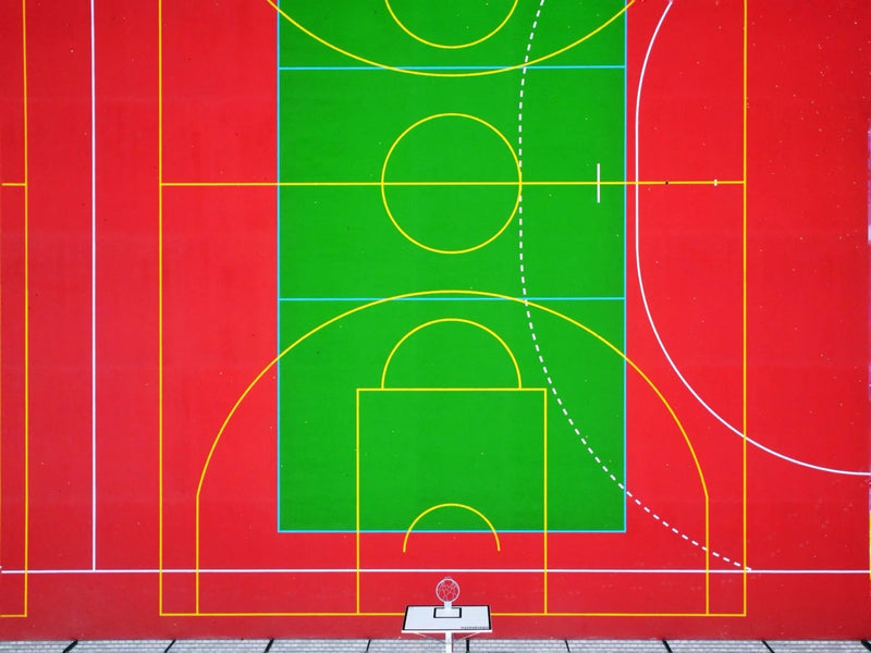 Padel court aerial drone view — 20m × 10m FIP-spec enclosed court