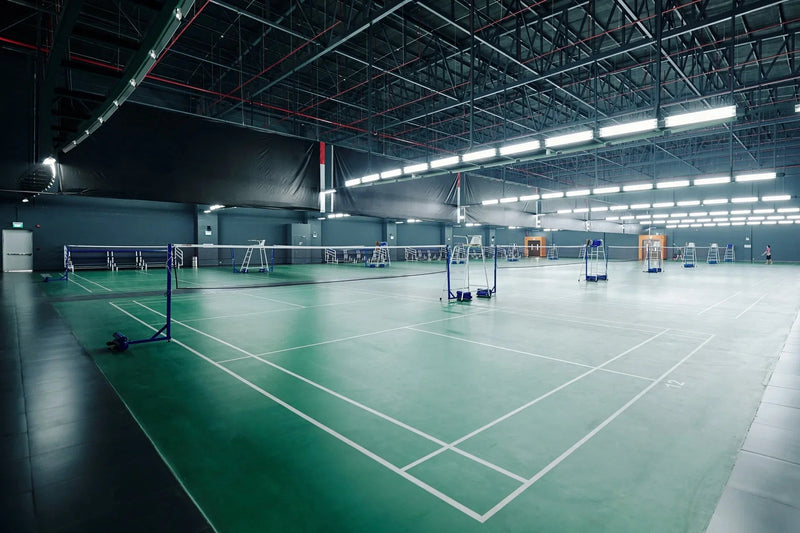 Indoor BWF-grade vinyl badminton courts — Yonex / Gerflor-equivalent surface