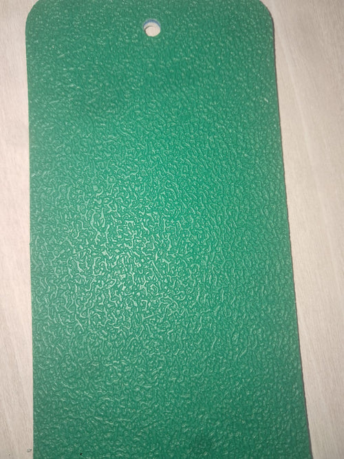 Anti-slip surface texture of a green PVC badminton court mat
