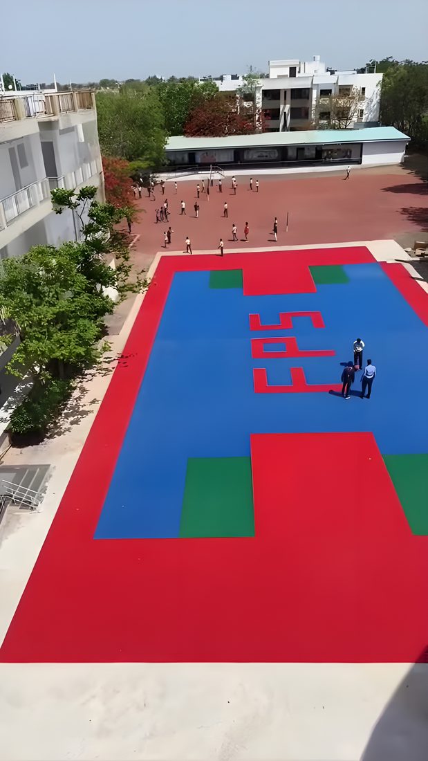 Aerial view of finished school multi-sport court with custom school branding, Sangola, Maharashtra