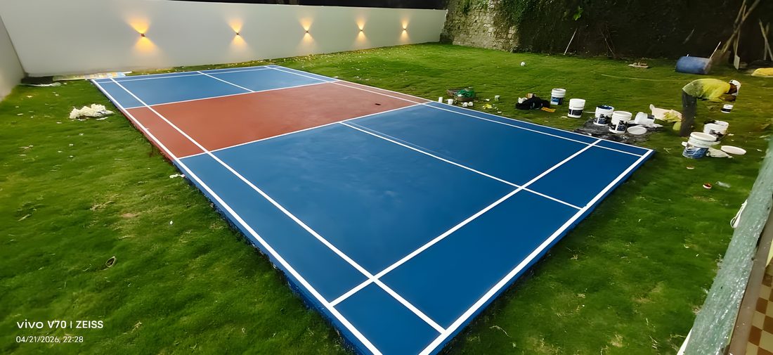 Court line marking finishing touches being completed on site