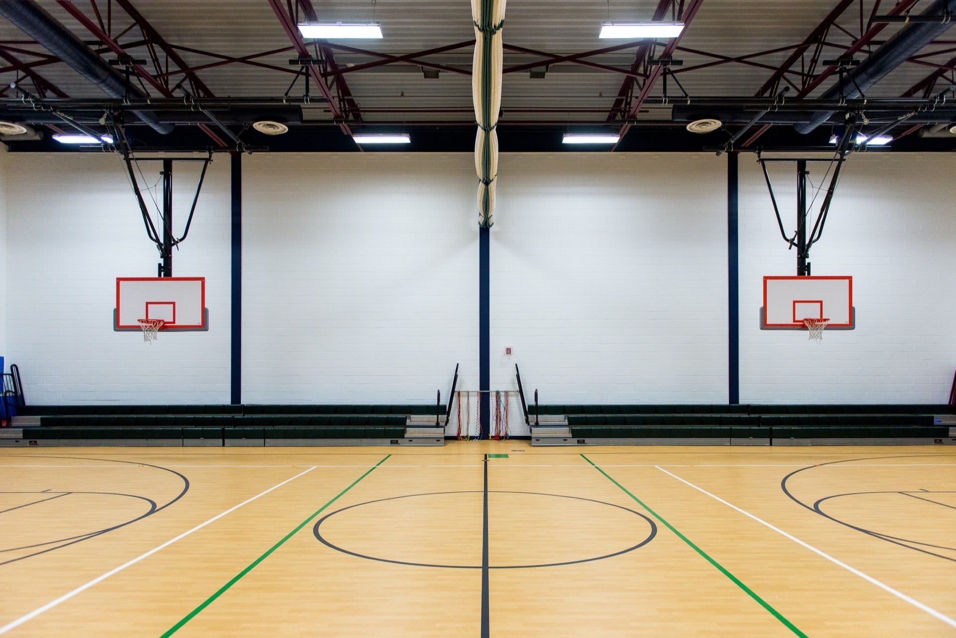 Dark Green acrylic basketball court with FIBA markings