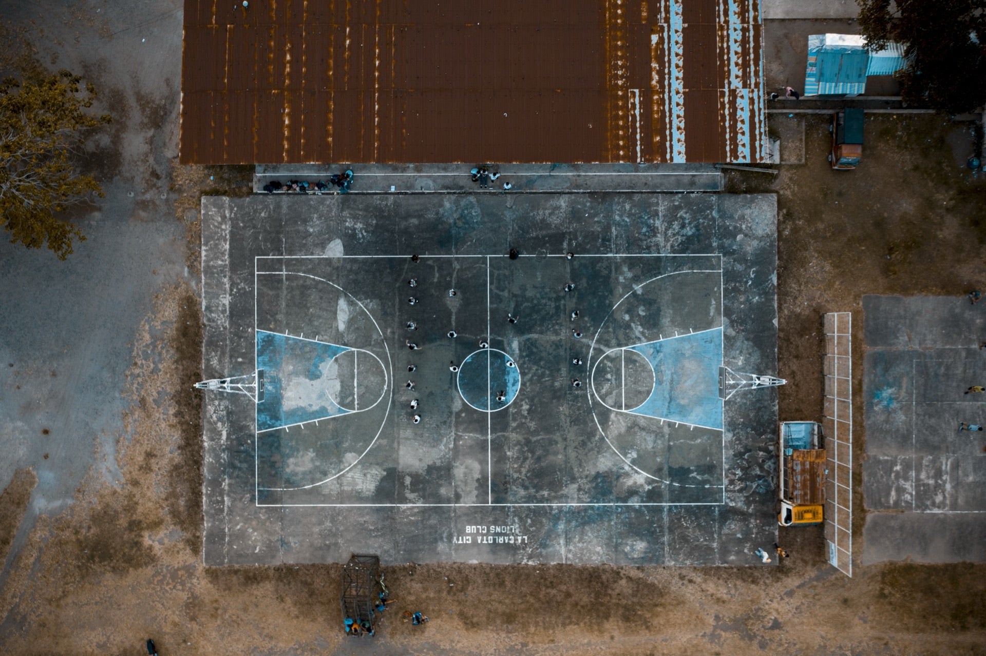 Blue PP tile basketball court — Phase 1 completion