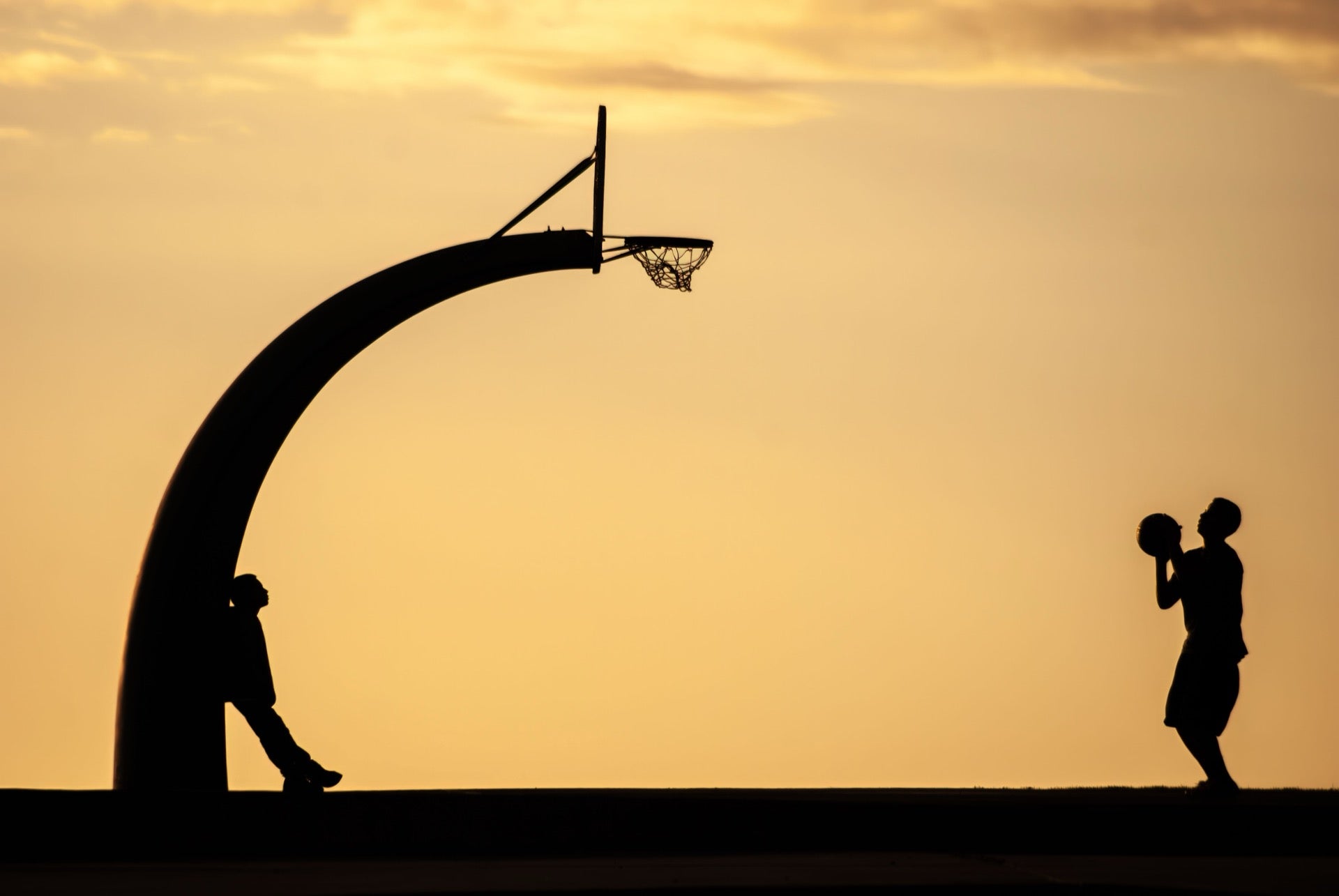 First night basketball session under LED floodlights on the completed Noida court