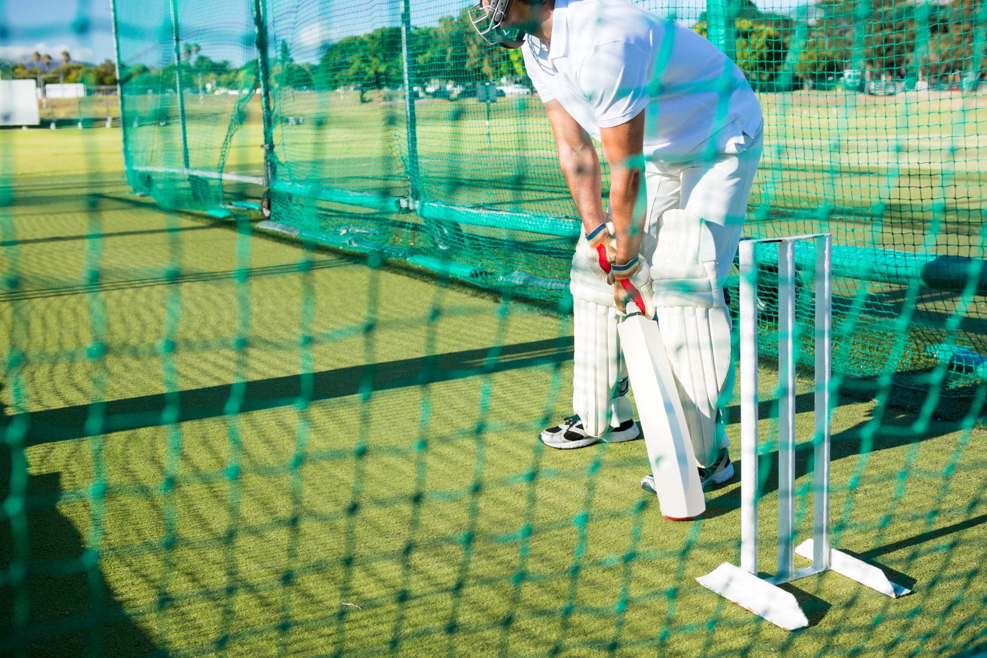 Practice nets at both ends of the cricket strip installed and tensioned