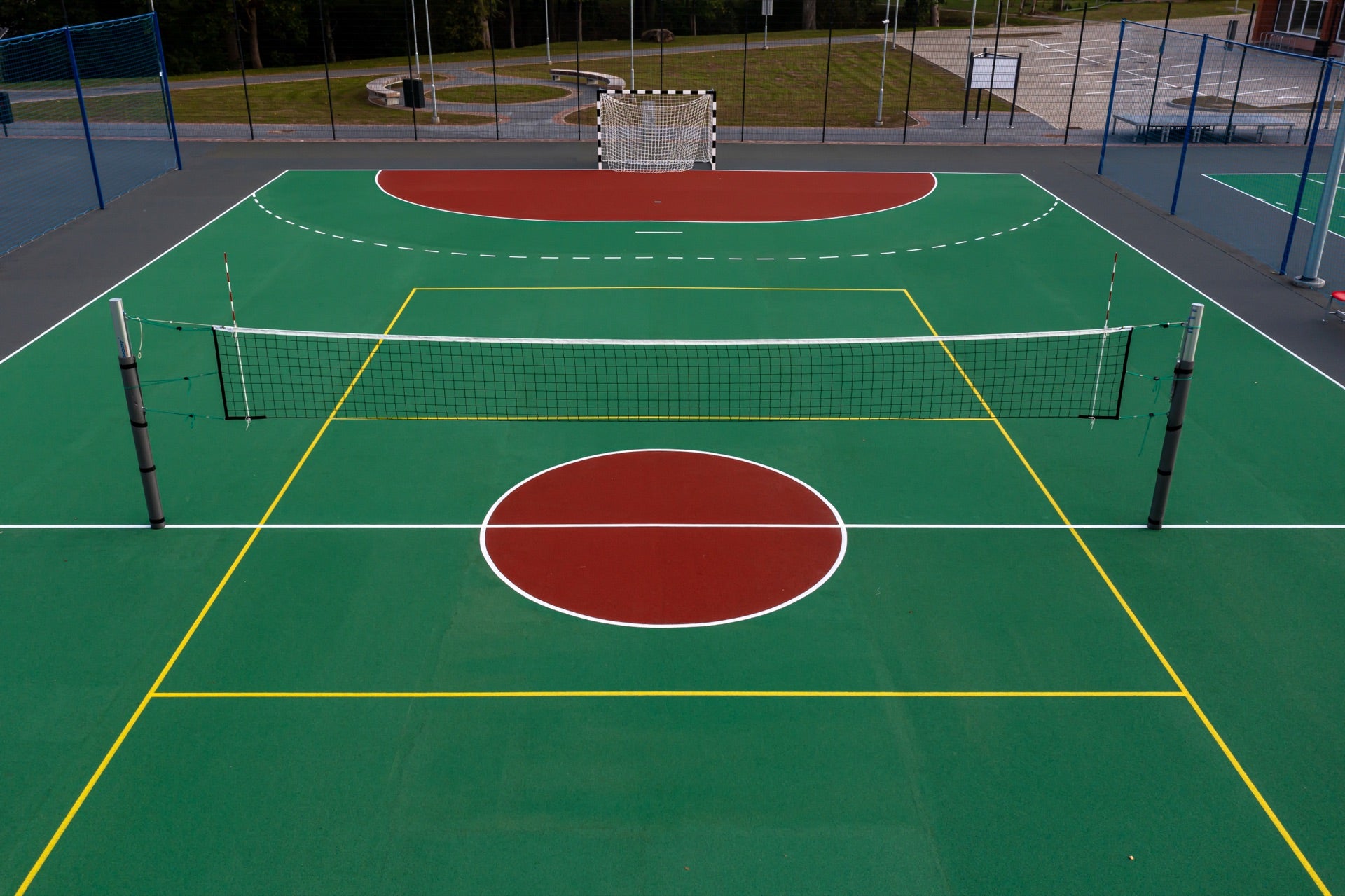 Grass Green acrylic panels marking the badminton court zones