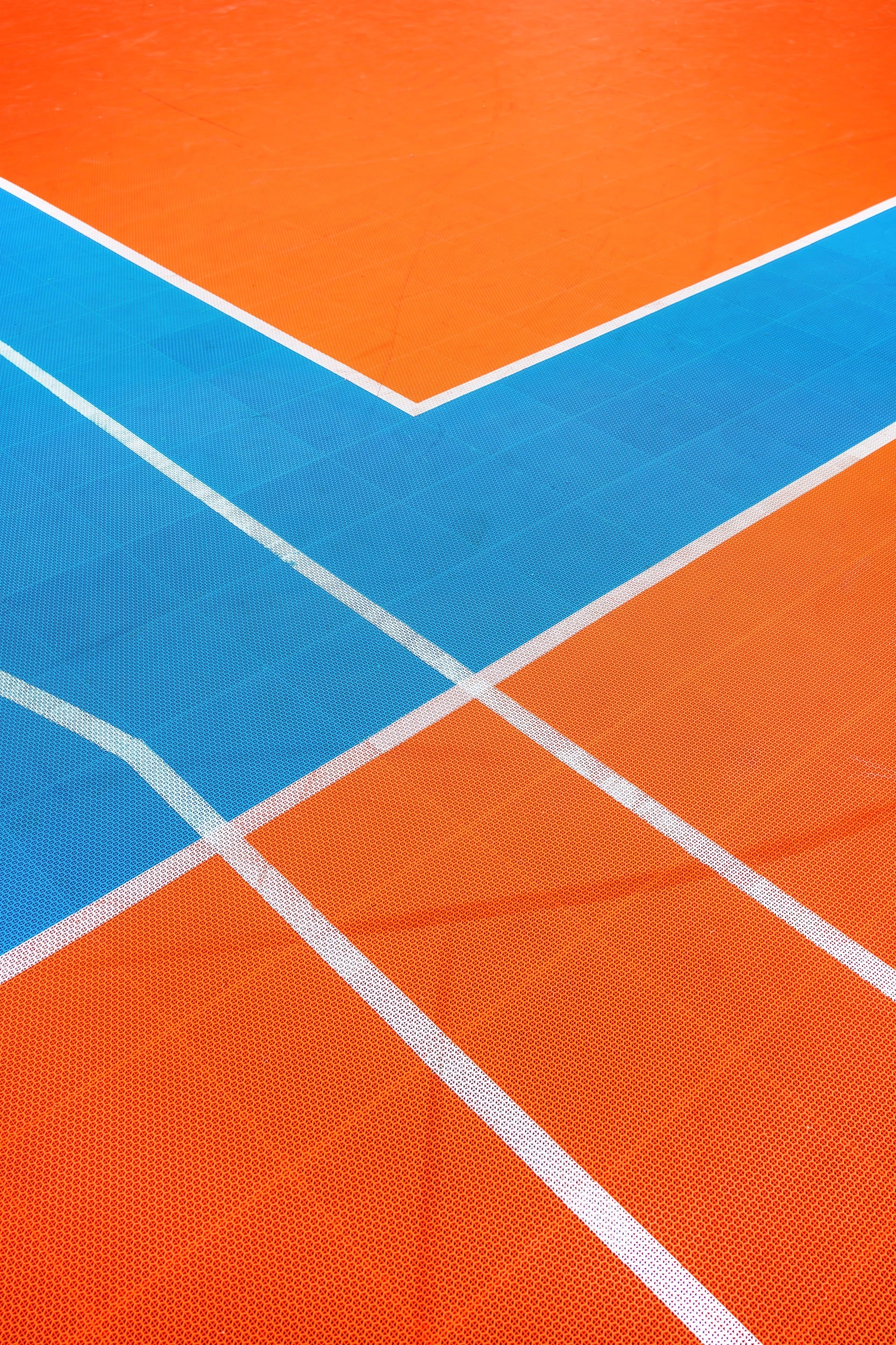 Completed multi-sport courts with valley view in background